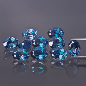 Oválný kámen, kužel - topaz London Blue 8x6 MM