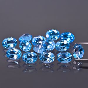 Oválný kámen, kužel - topaz Swiss Blue 6x4 MM
